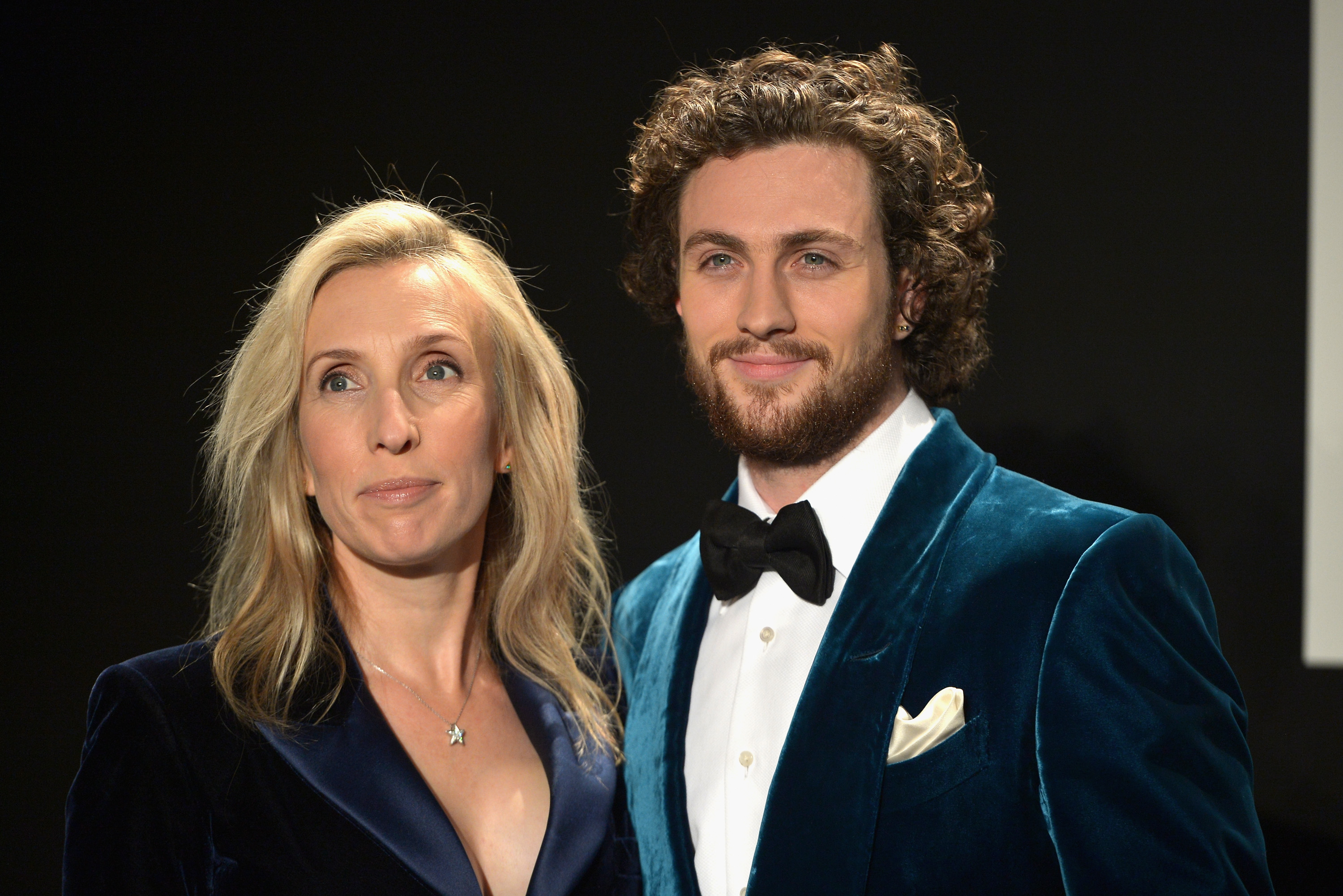 LOS ANGELES, CA - FEBRUARY 20: Director Sam Taylor-Johnson (L) and actor Aaron Taylor-Johnson, both wearing TOM FORD, attend the TOM FORD Autumn/Winter 2015 Womenswear Collection Presentation at Milk Studios in Los Angeles on February 20, 2015. (Photo by Charley Gallay/Getty Images for Tom Ford)